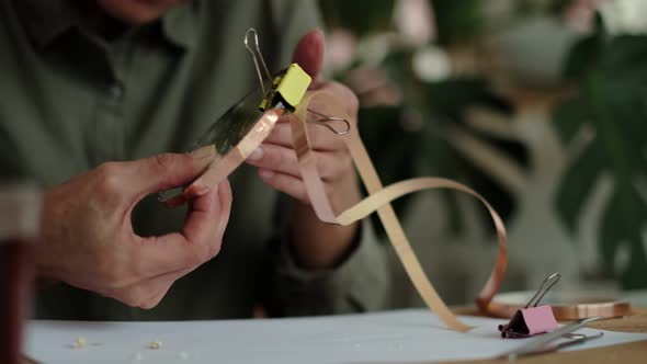 Woman Fixes Glass Plates