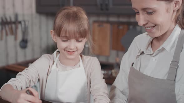 Little Girl Making Bread Dough