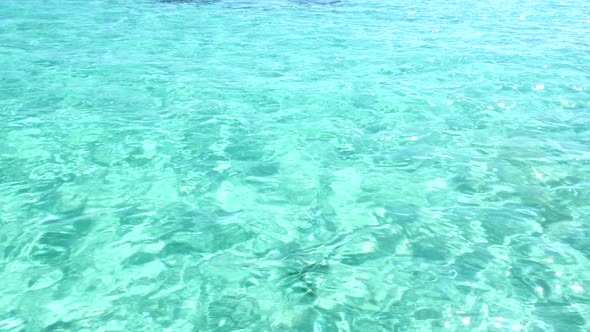 View From Boat to Crystal Clear Turquoise Sea Water with Coral Reef