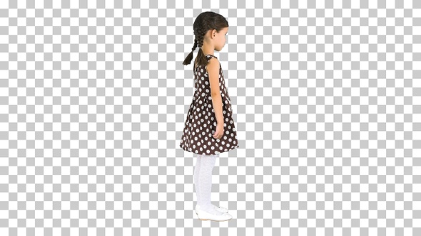 Cute little girl in polka dot dress talking, Alpha Channel