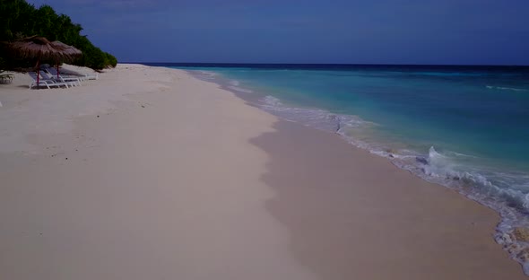 Beautiful above copy space shot of a white sand paradise beach and turquoise sea background in hi re