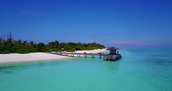 Daytime above abstract view of a sunshine white sandy paradise beach and aqua turquoise water backgr