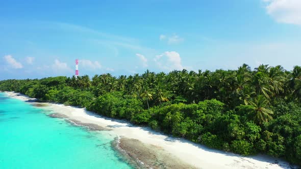 Aerial top down scenery of luxury seashore beach lifestyle by blue lagoon with white sand background