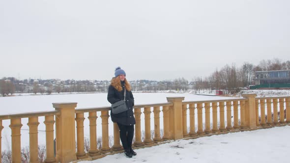 Woman And Frozen Lake