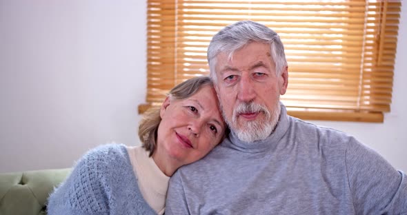 Portrait of an Elderly Couple a Woman Put Her Head on Her Husband's Shoulder