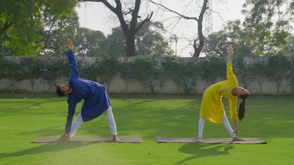 Indian couple doing stretching