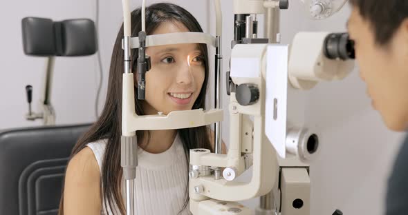 Woman doing eye test at the clinic 