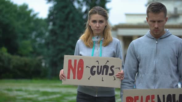 Young People Showing Slogans for World Peace, Against Nuclear Weapon, Terrorism