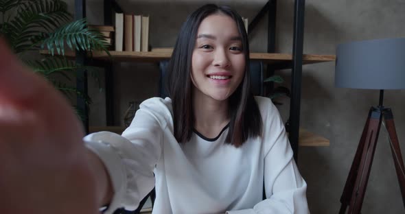 Resolution Point of View Shot of Beautiful Young Asian Girl Talking and Recording Content or Video