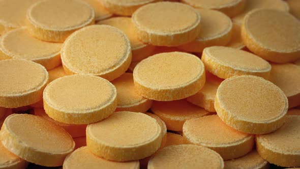 Pile Of Vitamin C Tablets Rotating