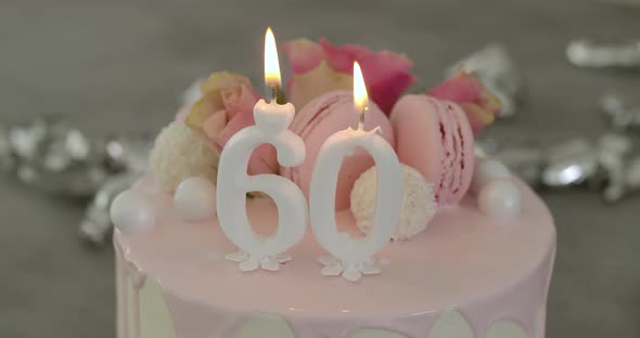 60th White Birthday Cake With Candles