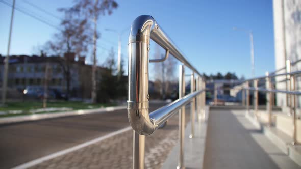 Shiny Metal Railing of Sloppy Ramp for Handicapped People