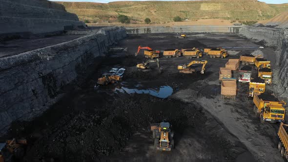 Industrial Mining Site With Trucks Drone View