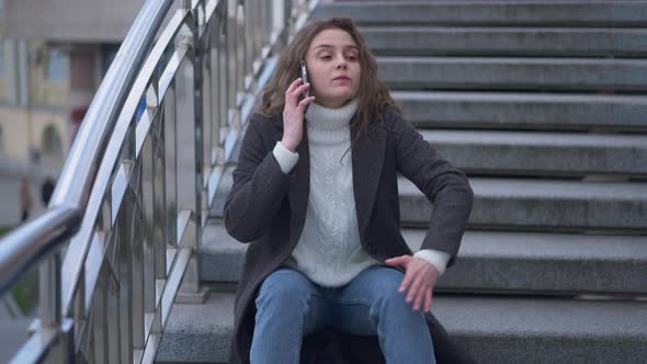 Angry Furious Young Woman Arguing Talking on the Phone in Slow Motion Hanging Up