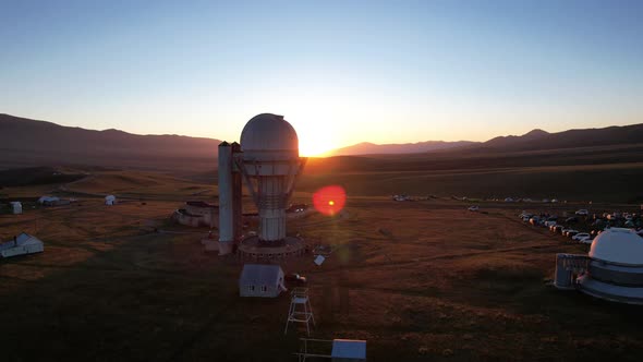 Bright Dawn Over the Observatory in the Mountains