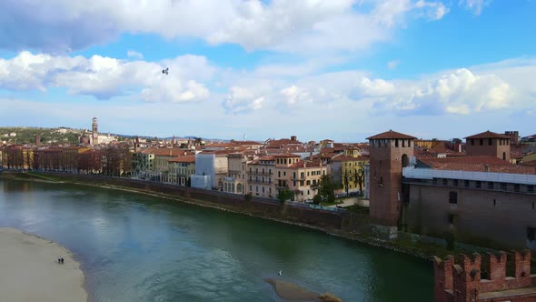 Flying back over the Adige River and Castelvecchio in Verona