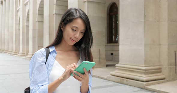 Woman use of mobile phone in Hong Kong 