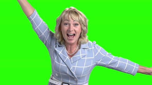 Excited Mature Woman on Green Screen.