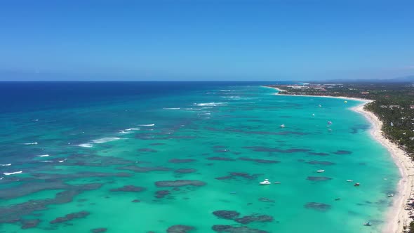 Tropical Seashore with Resorts and Turquoise Caribbean Sea