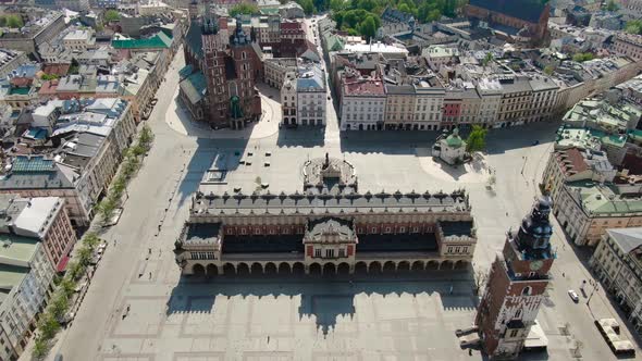 Flying over Main Square, Rynek Glowny in Krakow, Cracow city in Poland, Polska