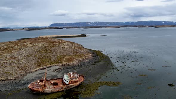 Western Iceland Drone Forgotten Boat wrecked on Baron Island with Black Sand Beach