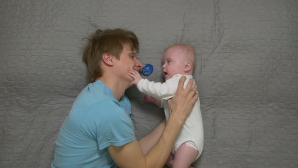 Father And Baby Pacifier