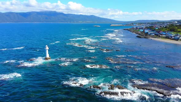 lighthouse off shore of shakotan, japan