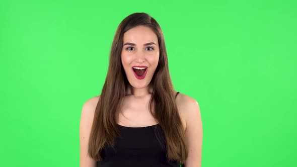 Very Surprised Girl with Shocked Wow Face Expression. Green Screen