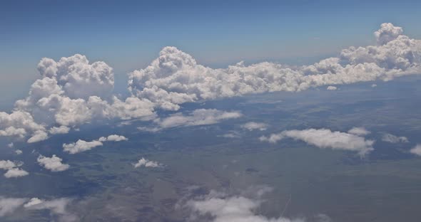 Amazing Skyline View From Airplane Sky Above the Clouds