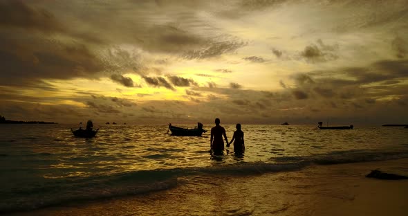 Fun lady and man in love dating on vacation enjoy luxury on beach on white sand background