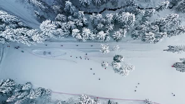 Bird's Eye View Of The Tourists On The Mountain Ski Resort In Bialy Potok In Poland. aerial