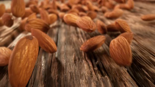 Super Slow Motion Detail Shot of Almonds Rolling Towards at 1000Fps with Camera Motion