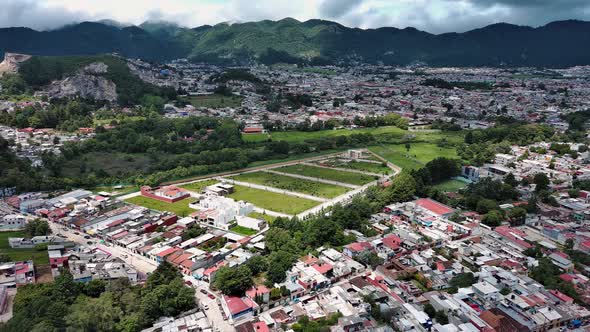 Magical Town Green Fields San Cristobal De Las Casas Aerial Drone Fly Above City