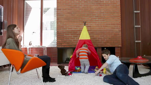 Family playing in living room