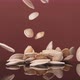 Flying Pumpkin Seeds on a Brown Background - VideoHive Item for Sale