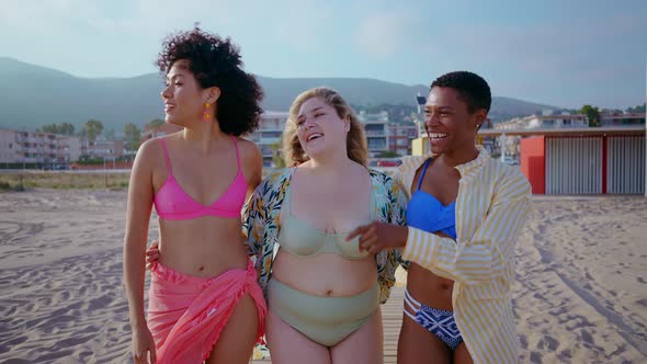 young women having fun on the beach