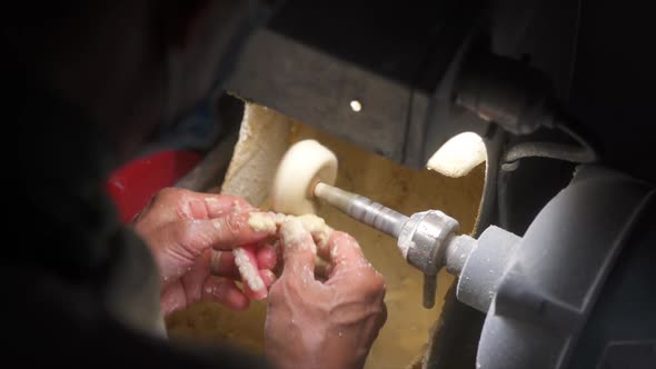 Dental Technician working on dentures