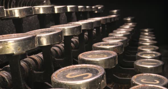 Vintage typewriter hidden behind book. Vintage journalist desk.