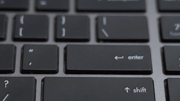 Enter Button Pressing a Lot of Times on Keyboard Laptop Keyboard Close Up