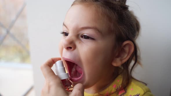 Girl Preschooler with Having Spray Medicine Treatment