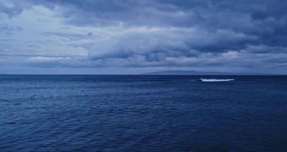 Flying Over Ocean at Dusk