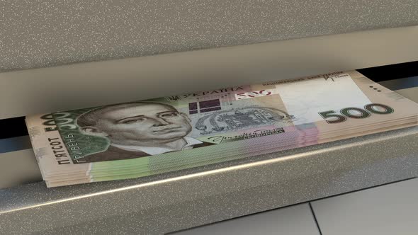 500 Ukrainian hryvnia in cash dispenser. Withdrawal of cash from an ATM.