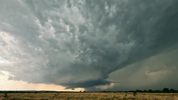 Timelapse of dangerous thunderstorm moving over the landscape in Texas