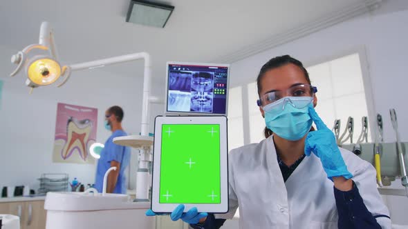 Pov Patient to Dentist Doctor Showing Tablet with Chroma Display