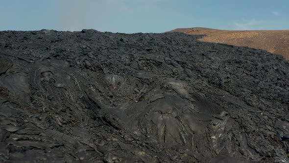 Pull Back Shot of Rugged Surface of Result of Previous Eruption