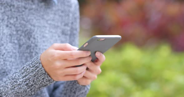 Woman use of smart phone at outdoor