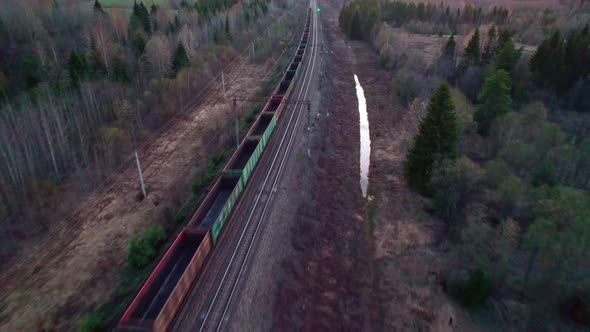 Riding Train Car Wagons Along the Forest