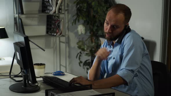 Male office worker, working late