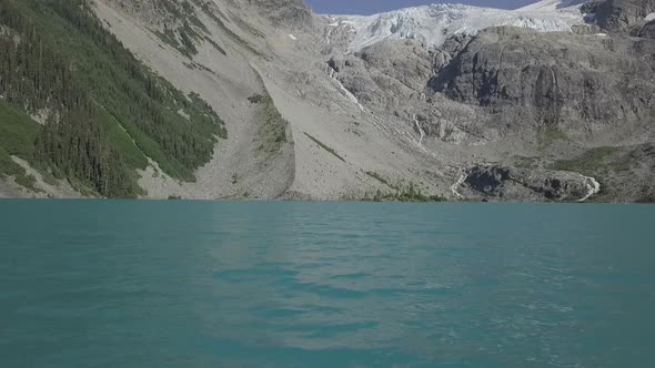 Drone shot of a glacier lake view in British Columbia, Canada