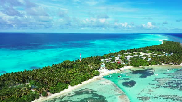 Beautiful above abstract view of a sandy white paradise beach and aqua blue ocean background in high